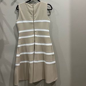 Tan dress with white stripe worn once for a Cotillion event